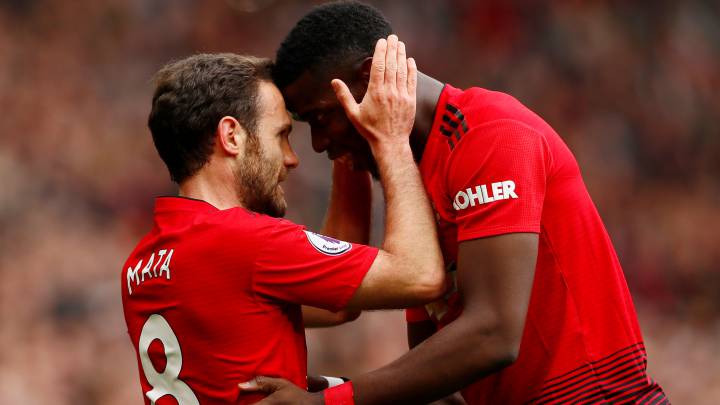 Soccer Football - Premier League - Manchester United v Chelsea - Old Trafford, Manchester, Britain - April 28, 2019 Manchester United's Juan Mata celebrates scoring their first goal with Paul Pogba Action Images via Reuters/Jason Cairnduff EDITORIAL USE ONLY. No use with unauthorized audio, video, data, fixture lists, club/league logos or "live" services. Online in-match use limited to 75 images, no video emulation. No use in betting, games or single club/league/player publications. Please contact your account representative for further details.