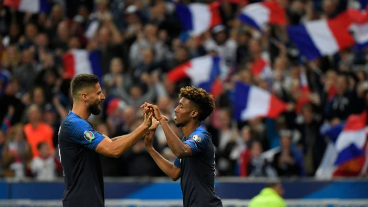 Giroud y Coman celebran el gol