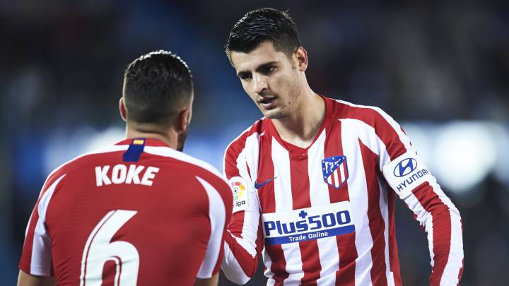 Koke y Morata celebran el gol del punta.