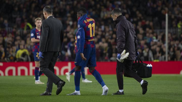 Dembélé abandona lesionado el terreno de juego ante el Dortmund.