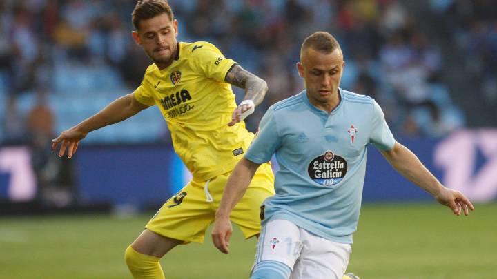 Stanislav Lobotka conduce el balón delante de Quintillá en el Celta-Villarreal de la pasada temporada.