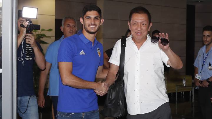 Guedes y Peter Lim.