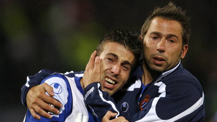 Luis García y Raúl Tamudo.