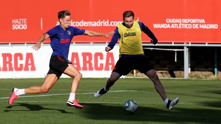 Llorente y Herrera, durante el entrenamiento del Atlético.
