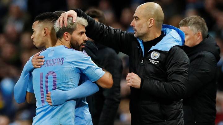 Soccer Football - Carabao Cup - Semi Final Second Leg - Manchester City v Manchester United - Etihad Stadium, Manchester, Britain - January 29, 2020 Manchester City's Sergio Aguero with manager Pep Guardiola as he was substituted for Gabriel Jesus Action Images via Reuters/Jason Cairnduff EDITORIAL USE ONLY. No use with unauthorized audio, video, data, fixture lists, club/league logos or "live" services. Online in-match use limited to 75 images, no video emulation. No use in betting, games or single club/league/player publications. Please contact your account representative for further details.