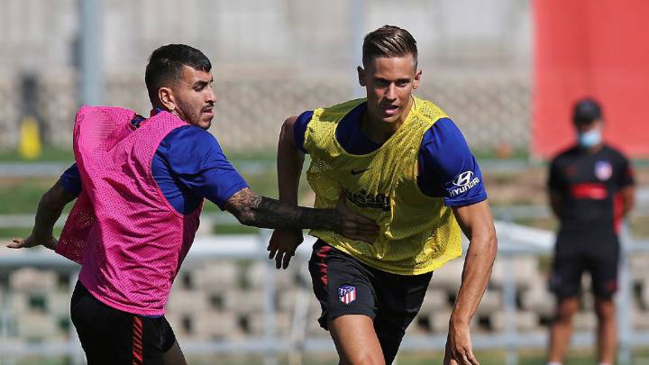 Marcos Llorente, junto a Correa en el entrenamiento del Atlético.