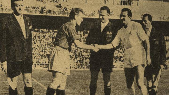 Los capitanes del Servette y del Madrid, Dutoit y Miguel Muñoz, se saludan antes del pitido inicial.