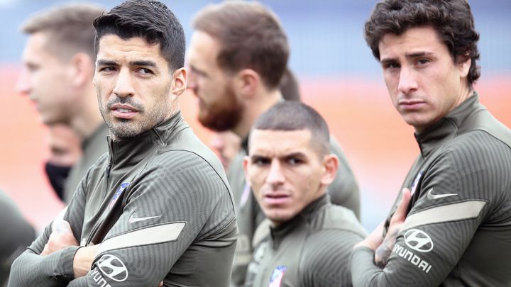 Suárez, Torreira y Giménez en el entrenamiento del Atlético