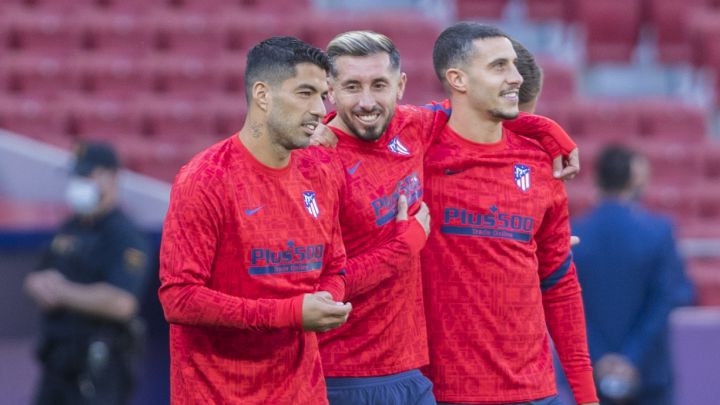 Luis Suárez junto a Herrera.