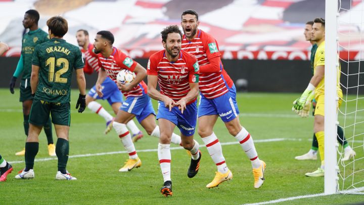 Germán celebra con Molina el gol del empate.