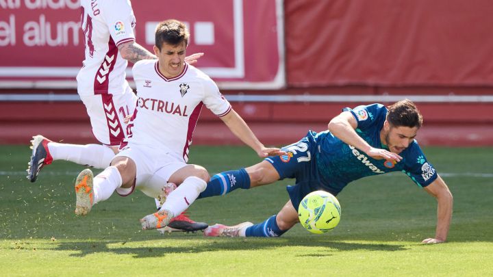 Oscar Gil of RCD Espanyol is fouled by Manuel Fuster of Albacete BP during the Liga Smartbank match