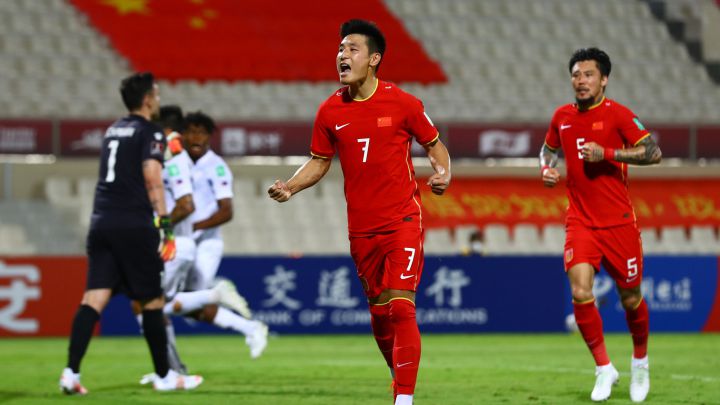 Soccer Football - World Cup - Asia Qualifiers - Second Round - Group A - China v Philippines - Sharjah Football Stadium, Sharjah, United Arab Emirates - June 7, 2021 China's Wu Lei celebrates scoring their first goal with Zhang Linpeng REUTERS/Christopher Pike