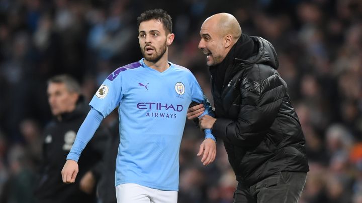 Bernardo Silva con Pep Guardiola.