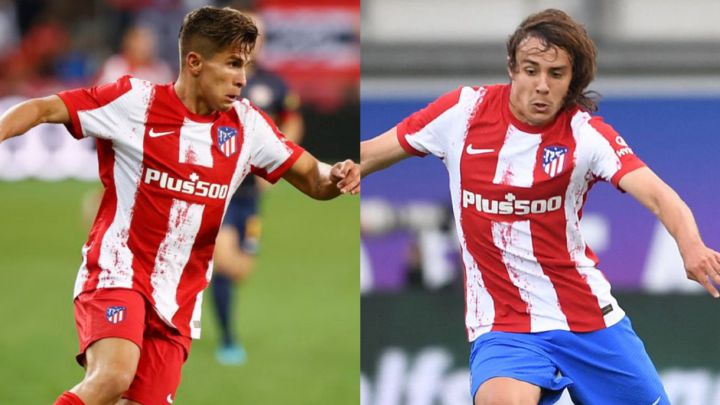 Giuliano Simeone y Javi Serrano.