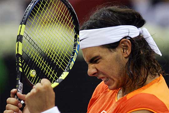 Nadal gana en dobles el primer asalto a Federer