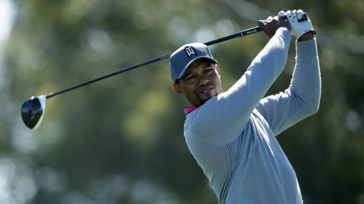 Tiger Woods se despide del
torneo y Justin Rose sigue líder