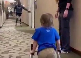 Ejemplo inspirador de un atleta paralímico con niño de 2 años