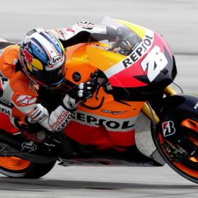 Pedrosa, el más rápido en una jornada truncada por la lluvia Pedrosa, el más rápido en una jornada truncada por la lluvia