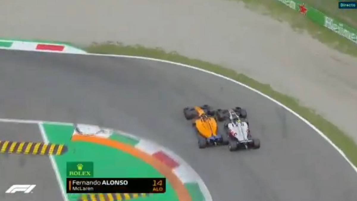 Magnussen y Alonso.