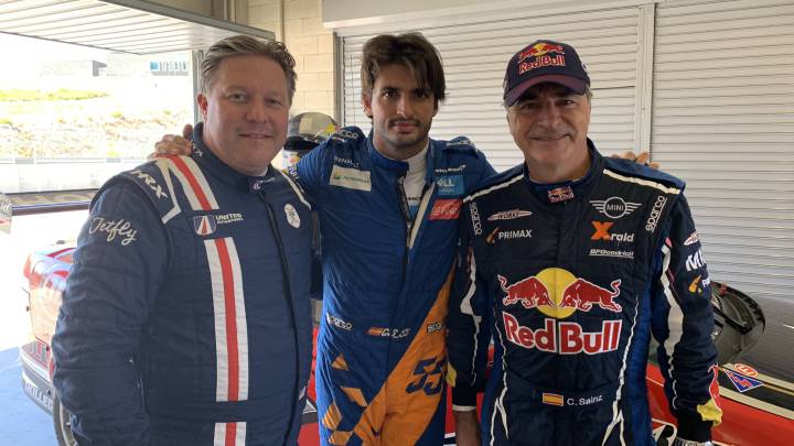 Los Sainz con Zak Brown.