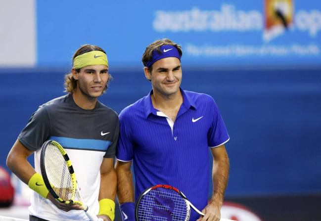 Rafael Nadal y Roger Federer en la presentación de un partido de individuales.