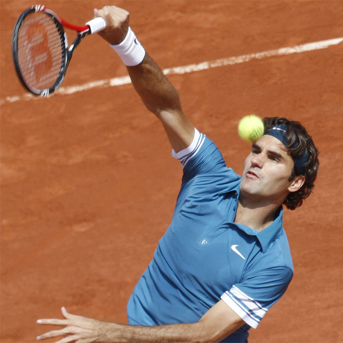 Federer y Djokovic superan a Reister y Nishikori
