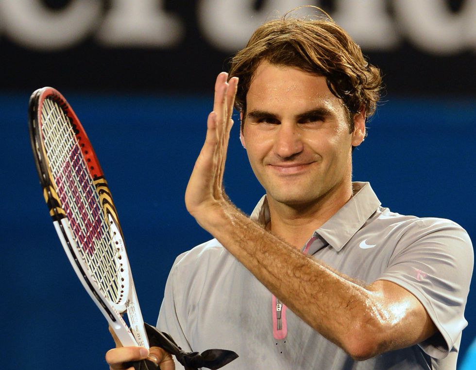 Federer vence a Davydenko y le espera el australiano Tomic
