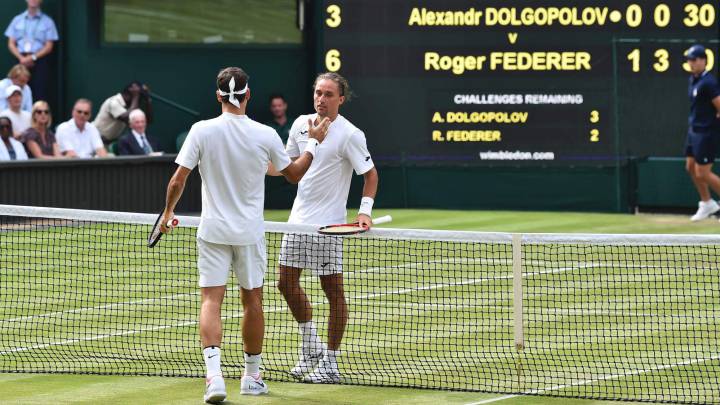 Roger Federer y Alexander Dolgopolov.