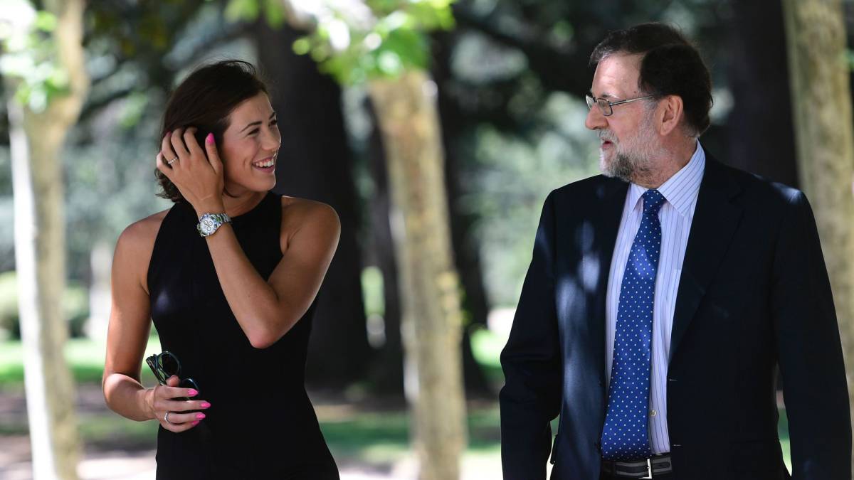 Garbiñe Muguruza paseando con Mariano Rajoy.