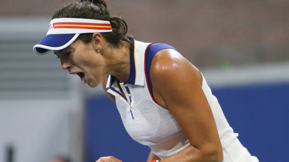 Garbiñe Muguruza celebra su victoria contra Duan.