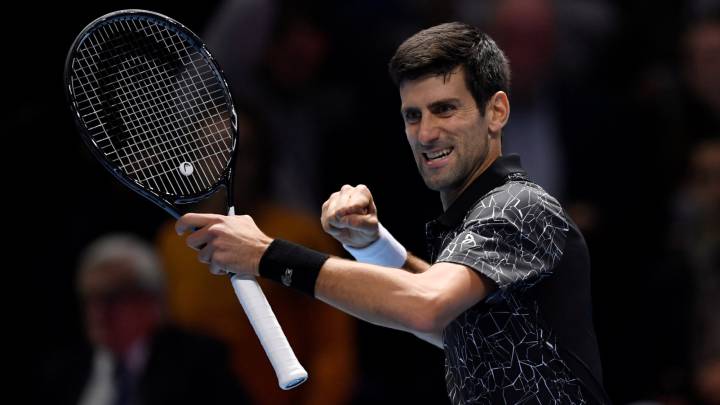 Novak Djokovic celebra su victoria contra John Isner en las ATP Finals 2018