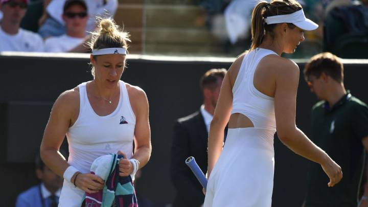 Maria Sharapova abandona por lesión ante Pauline Parmentier durante su partido de primera ronda de WImbledon.