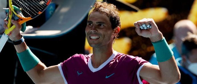 Spain's Rafael Nadal celebrates after winning the match against Marcos Giron of the US during their men's singles match on day one of the Australian Open tennis tournament in Melbourne on January 17, 2022. (Photo by Brandon MALONE / AFP) / -- IMAGE RESTRICTED TO EDITORIAL USE - STRICTLY NO COMMERCIAL USE --