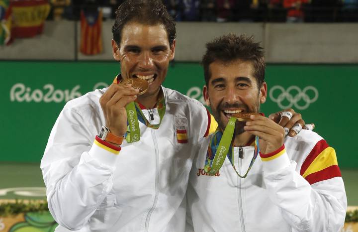 Why do Olympic athletes bite their gold medals?