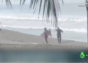 Hay que cosas que no se pueden concebir: cómo sacó un policía a un surfista de la playa