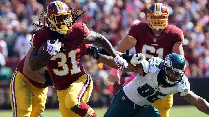 Los Redskins corren y paran la carrera para ganar a Eagles