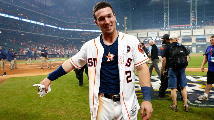 Alex Bregman celebra el hit definitivo que dio el triunfo a los Houston Astros en un partido dramático de Series Mundiales contra los Dodgers.