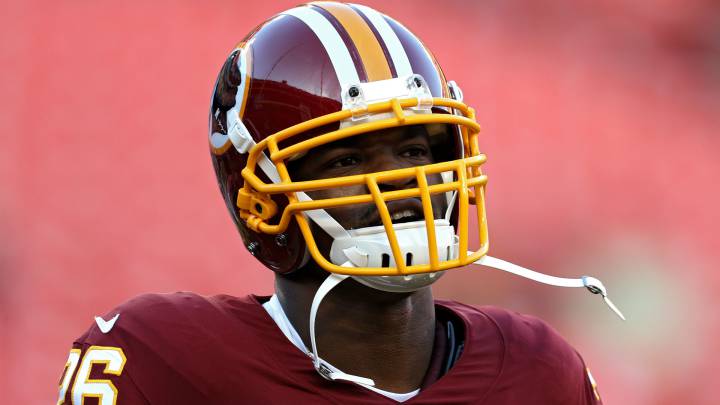 Adrian Peterson con el uniforme de los Washington Redskins