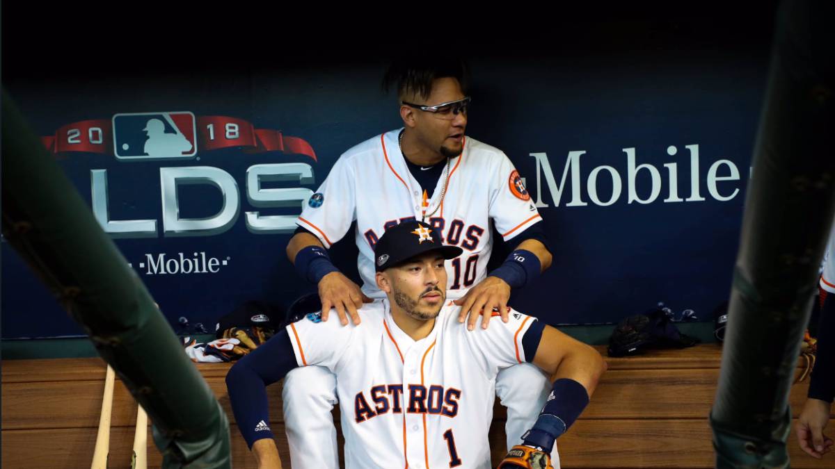 Yuli Gurriel y Carlos Correa