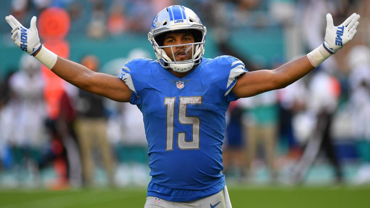 Golden Tate contra los Dolphins
