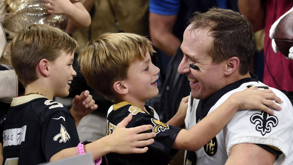 Drew Brees con sus hijos
