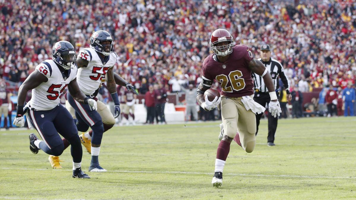 Adrian Peterson corre con Texans