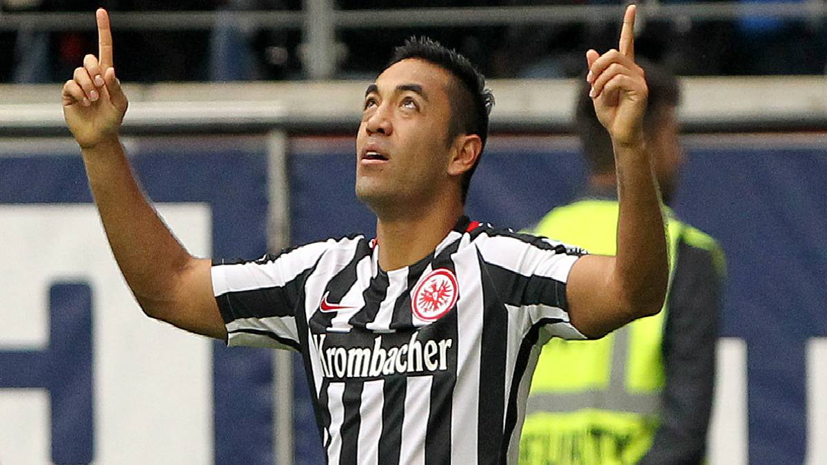 Mexican midfielder Marco Fabian celebrates scoring the 2-2 during the German first division Bundesliga football match between Eintracht Frankfurt and FC Bayern Munich