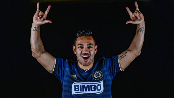 Marco Fabián possing with his new shirt from Philadelphia Union