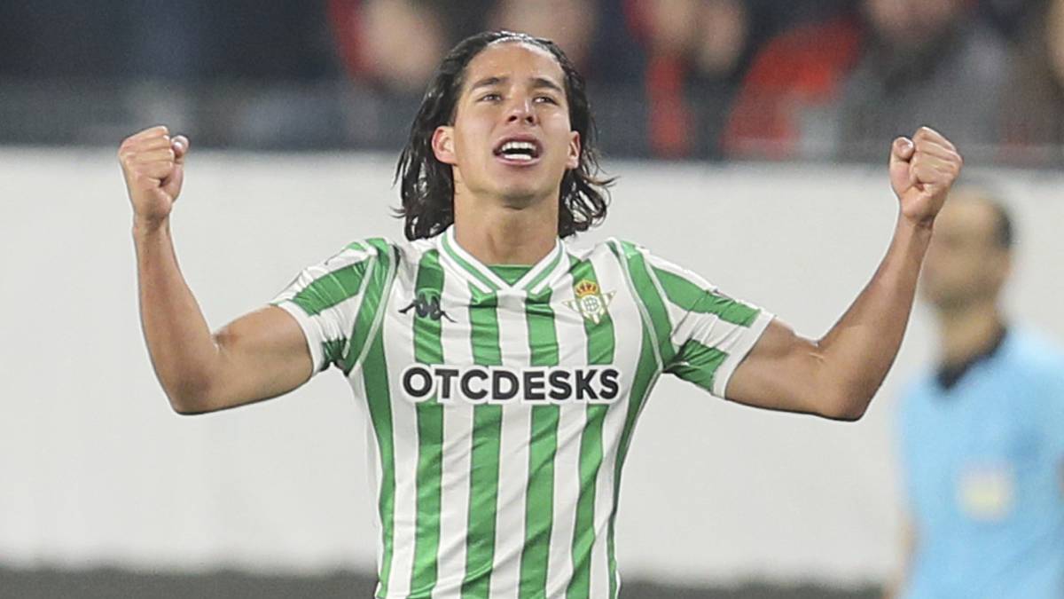Diego Lainez celebrates after scoring his side's equalizer during the UEFA Europa League round of 32 soccer match between Rennes and Real Betis