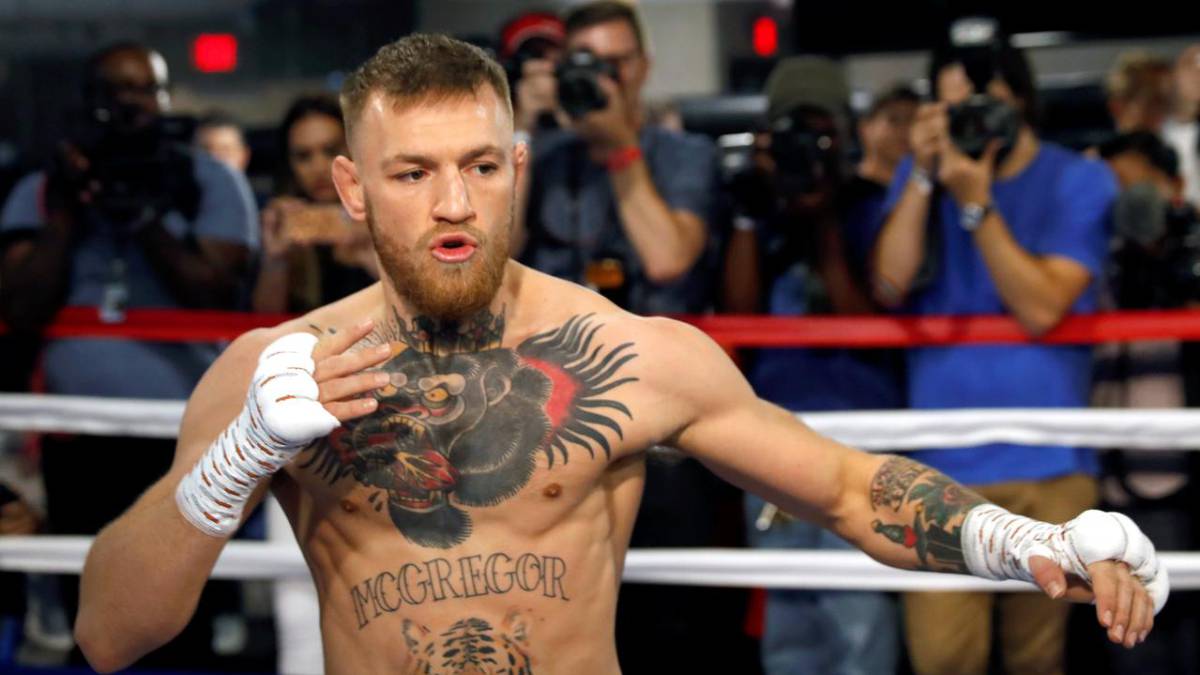 Conor McGregor appears in the ring before a fight