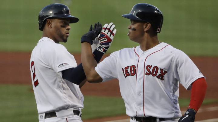 Xander Bogaerts y Rafael Devers con los Red Sox