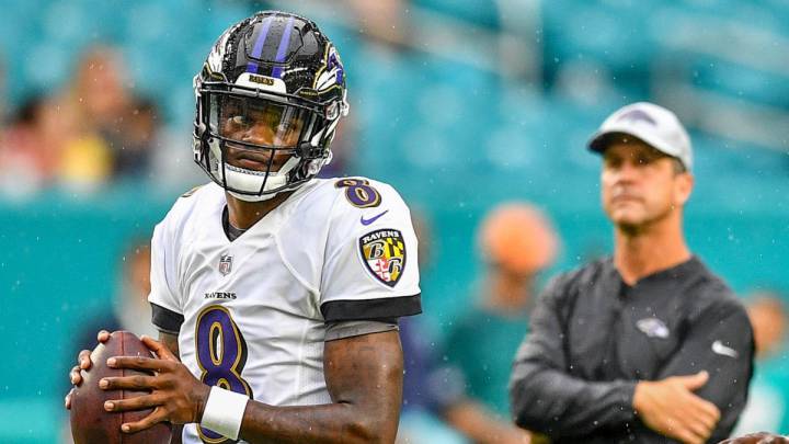 Lamar Jackson y John Harbaugh