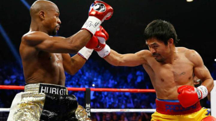 Mayweather y Pacquiao peleando