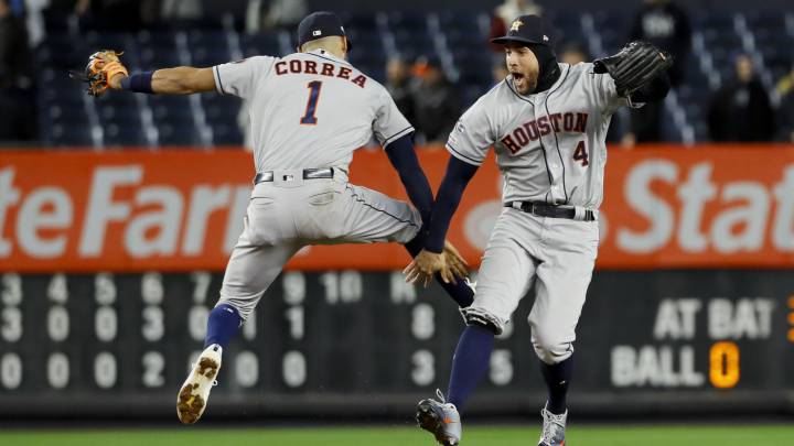 Carlos Correa y George Springer en la ALCS